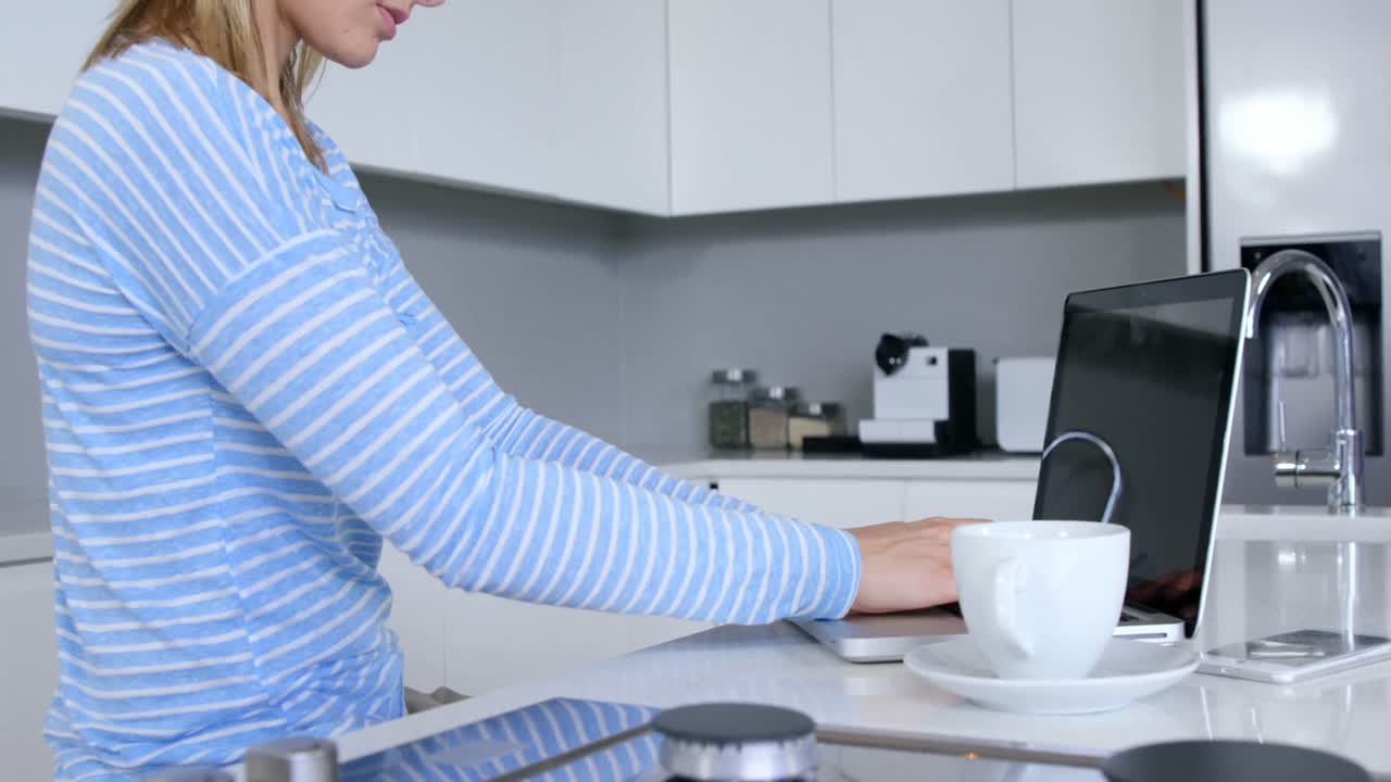 Women typing on laptop