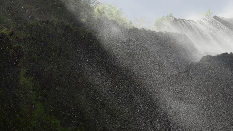 scenic-view-of-water-drops-falling-from-rocks-of-a-waterfall-in-the-Philippines