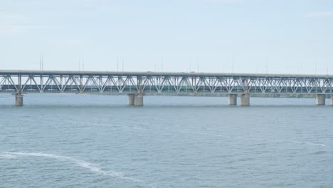 view of the long bridge crossing a wide river