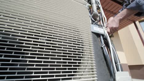 hvac technician installs heating, ventilation and air conditioning systems. heat pump