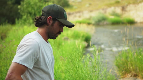 Fly-Fishing,-Fly-casting-on-a-fast-moving-river-on-a-beautiful-day-in-Montana