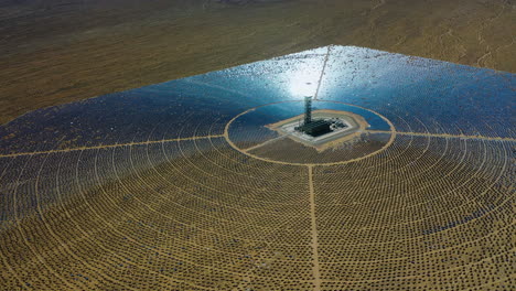 aerial view overlooking a heliostat solar power plant, in sunny southwest usa