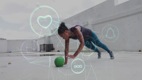 animación de iconos tecnológicos sobre una mujer haciendo ejercicio con una pelota