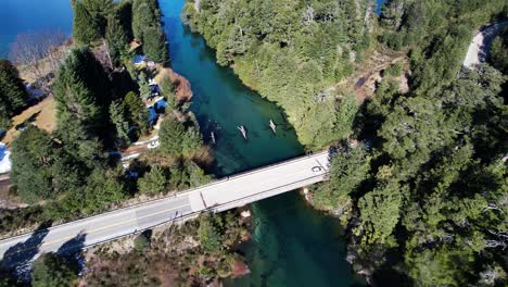 vehicle driving on bridge beautiful remote landscape of argentina, aerial view