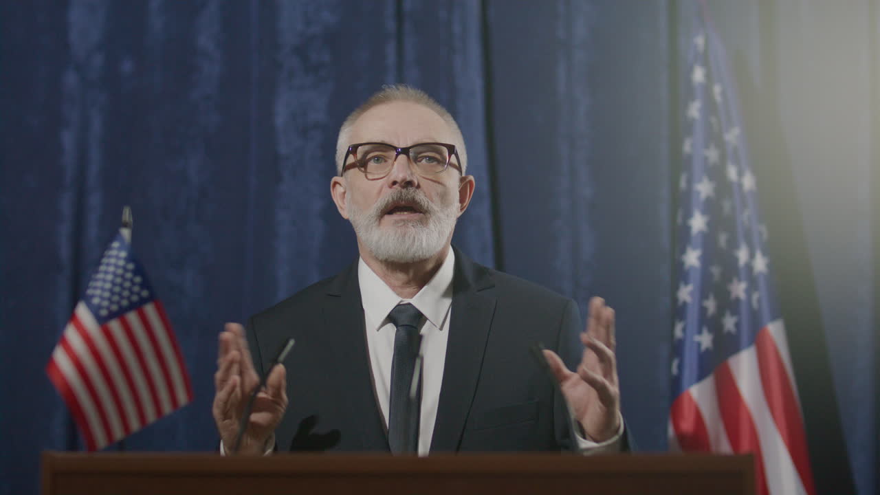 Senior Politician Speaking to Press during Election Campaign Event