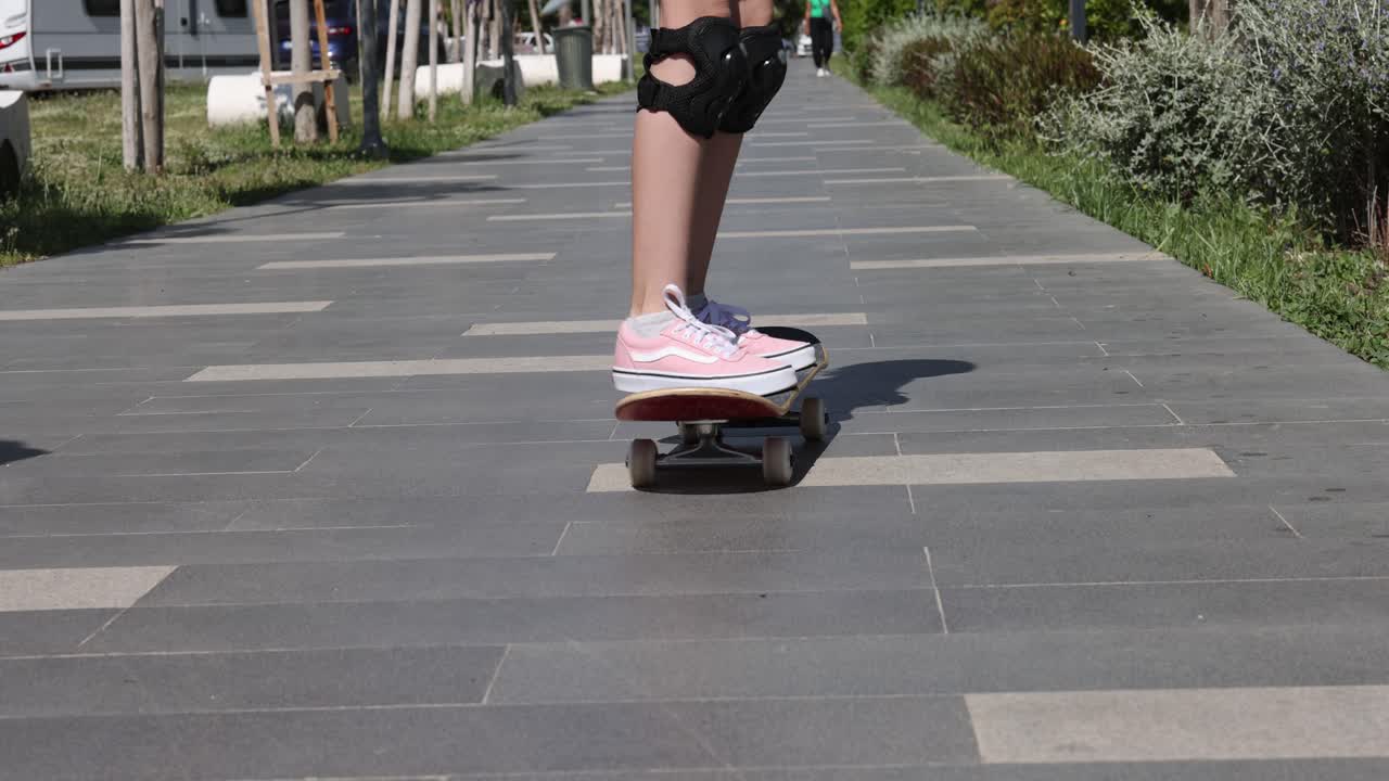 Skateboarding on a sidewalk