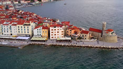 cinematic drone shot of piran, picturesque coastal town on adriatic sea in slovenia