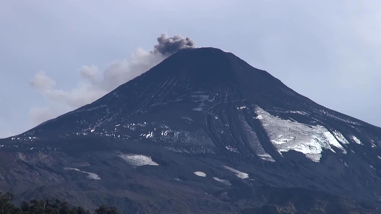 Villarrica Volcano releasing ashes in Pucón, Chile. April 06, 2015