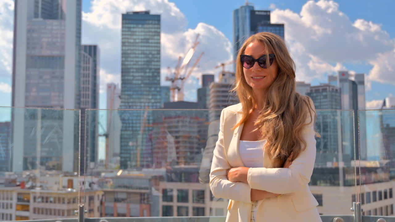 Blonde woman at the Main Tower with Observation Platform in Frankfurt, Germany