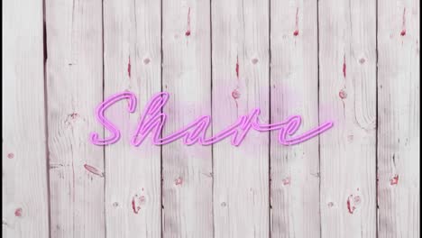 animation of illuminated pink share text over wooden background
