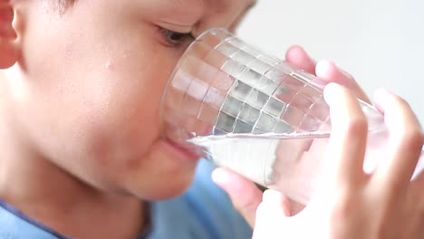 drinking water from glass thirsty boy sock footage