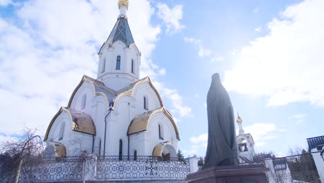 orthodox church and monument in winter