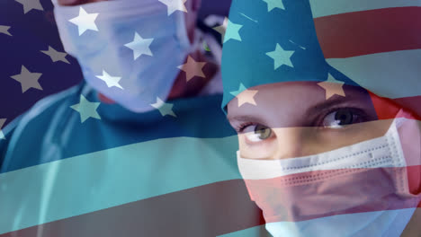 animation of flag of usa over diverse doctors wearing face masks