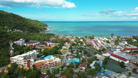 Drone-shot-of-blue-waters-around-Haadrin-town-Koh-Phangan-Thailand