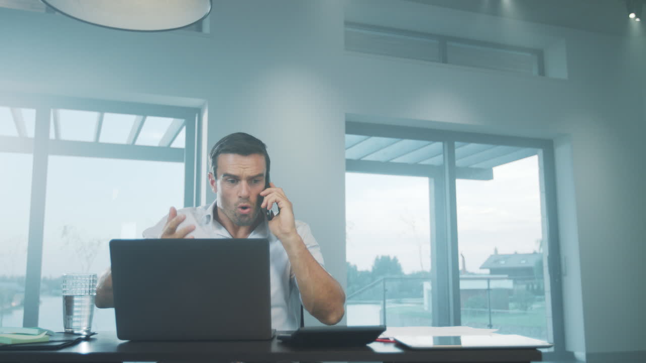 Business man yelling on mobile