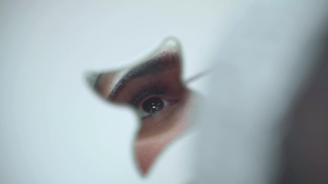 Reflection Of Models Eye In A Mirror During Beauty Procedure, Closeup Shot