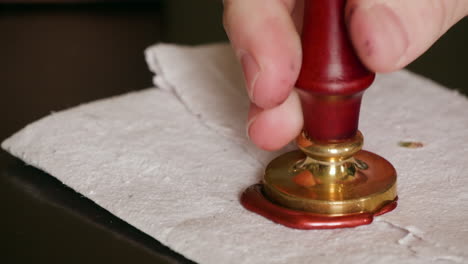 creating a wax seal on a parchment