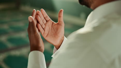 a muslim man praying