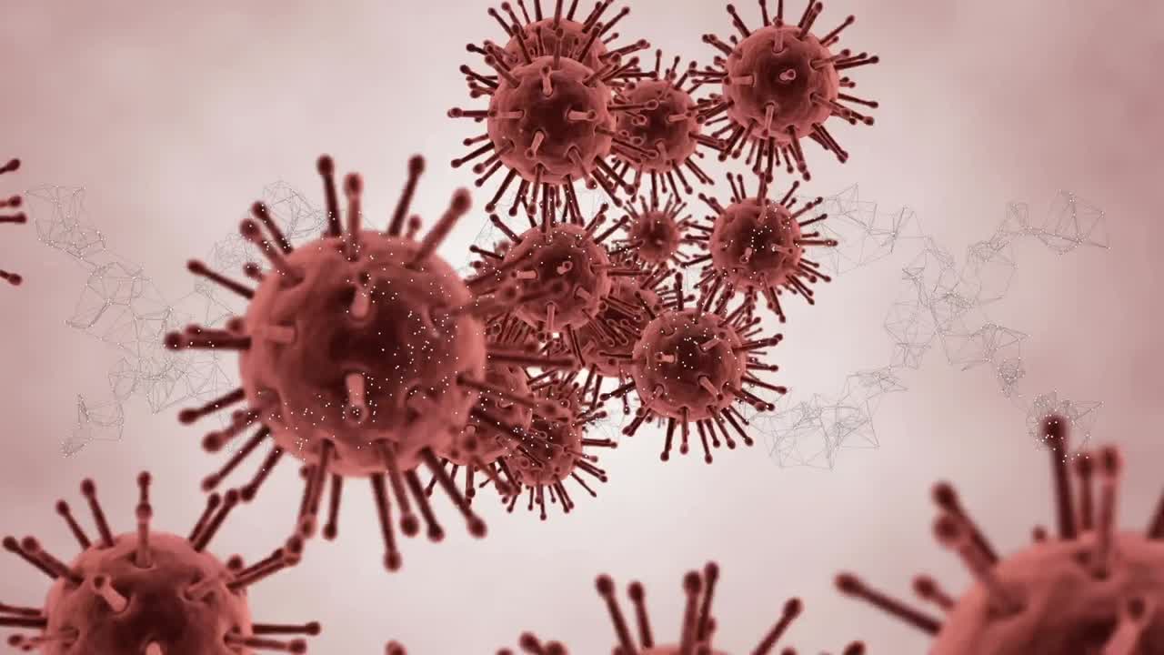 Animazione di filamento di DNA che ruota su cellule COVID-19 che fluttuano