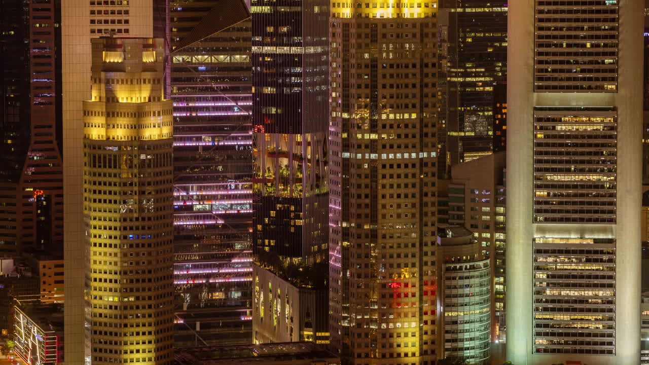 SINGAPORE - 3 MARCH 2025 : timelapse of the singapore city skyline from a high vantage point at night