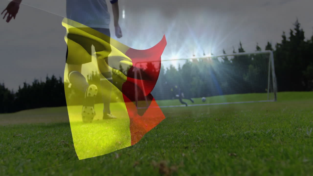 Belgian flag animation over soccer player kicking ball towards goal on field