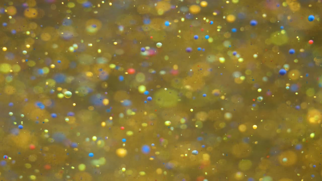 Slow Motion Bright Colors Bubbles Oil Beautiful Paint Universe Color Moving Multicolored Closeup. Acrylic Paint. Fantastic Surface. Abstract Colorful Paint Metamorphosis Structure Colorful Bubbles