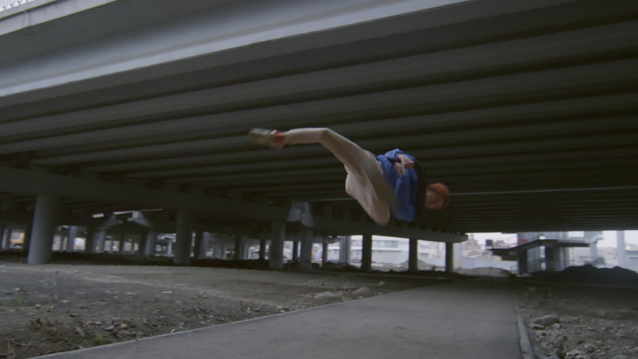 Parkourist Performing Epic Stunt on Street