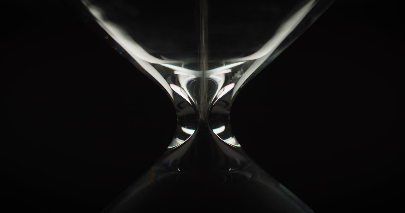 Sand moving in upside down hourglass
