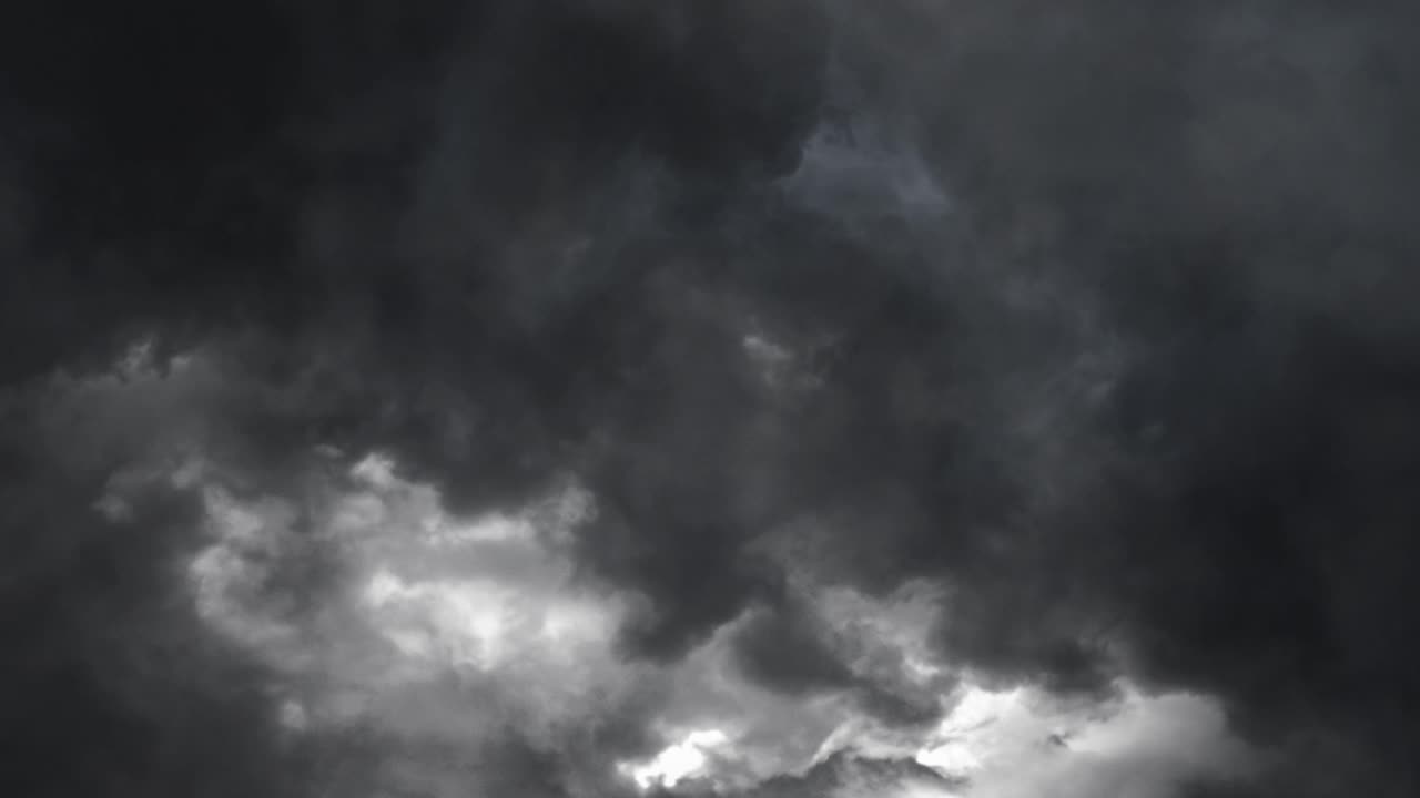 A dramatic thunderstorm dark clouds  view