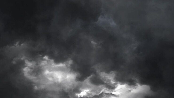 A dramatic thunderstorm dark clouds view