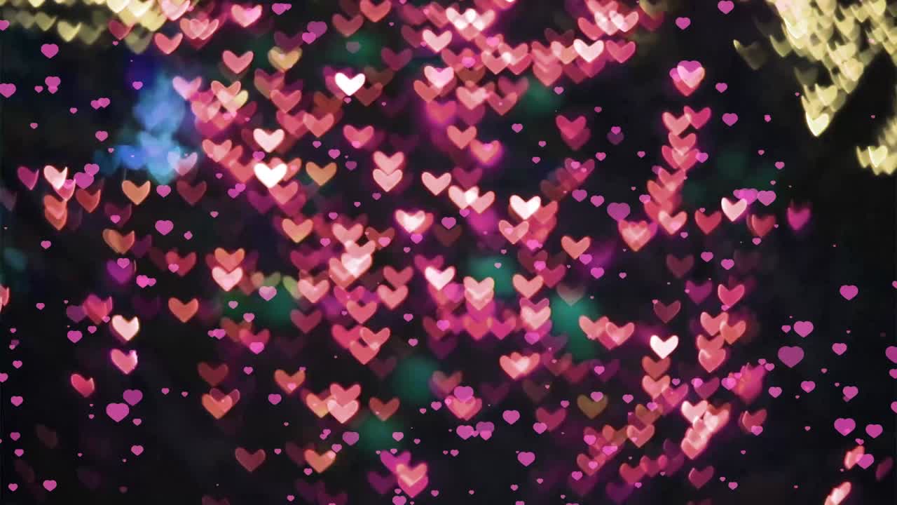 pequeños corazones cayendo y borroso forma rosa corazón cambio de color de fondo