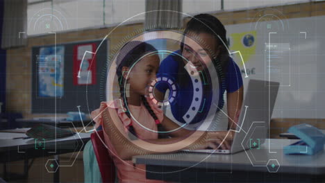 Teacher guiding student in classroom, featuring holographic HUD overlay above laptop screen