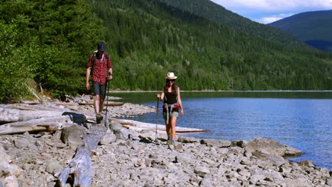 hiker couple hiking near riverside 4k