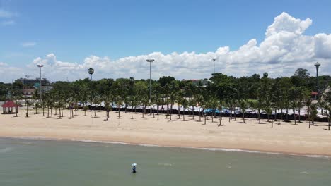 ban amphur beach in sattahip, thailand. aerial drone shot.