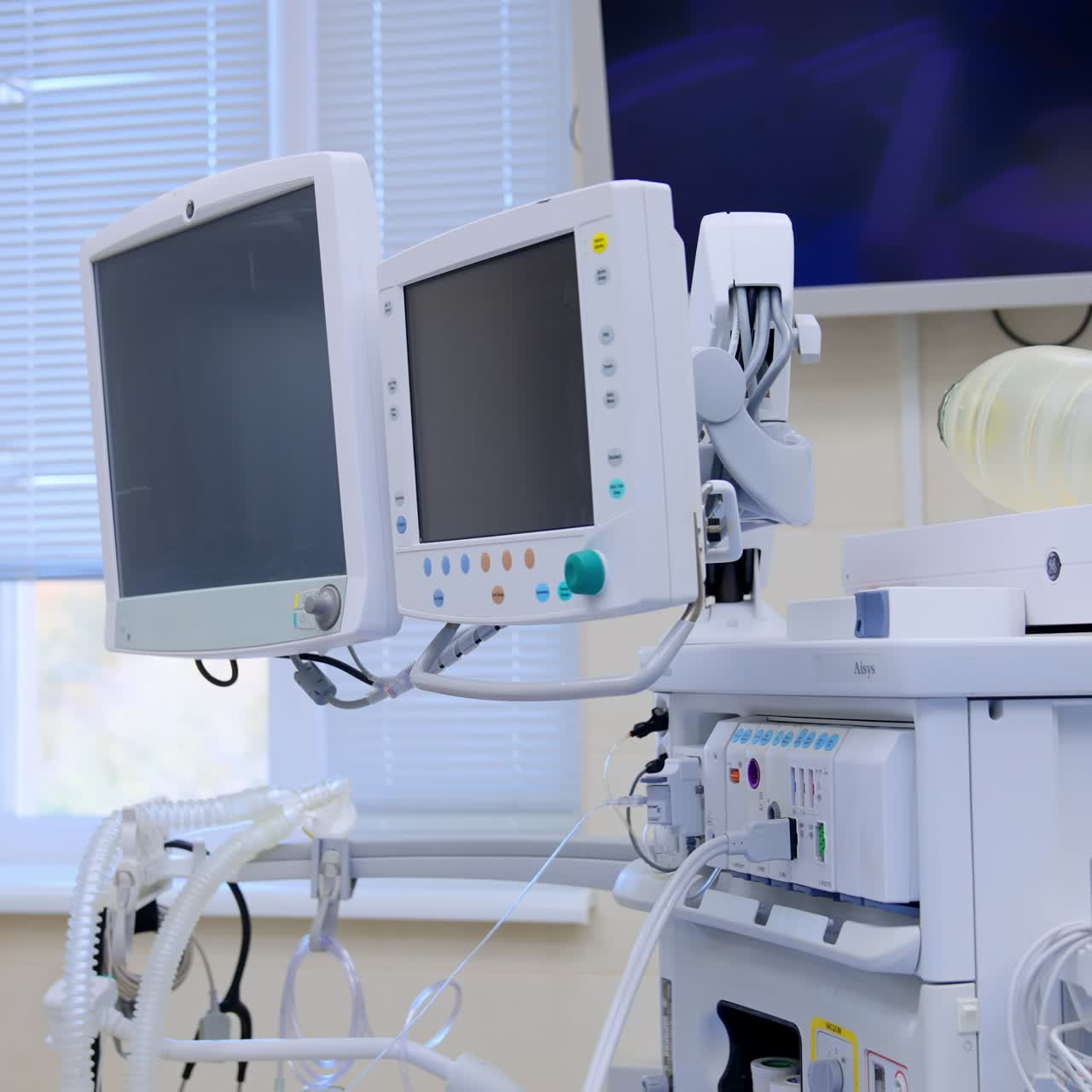 Screens and monitors of technological equipment in surgical room. Apparatuses and devices with switched off black monitors