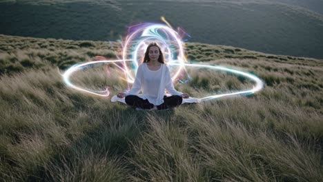 a serene video scene of a woman meditating in a grassy field, captured from a low angle