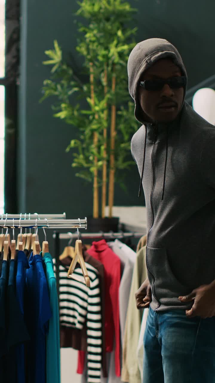 People shopping for clothes in a store