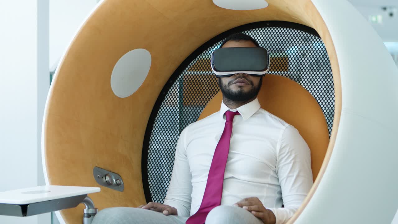 Serious businessman in vr headset