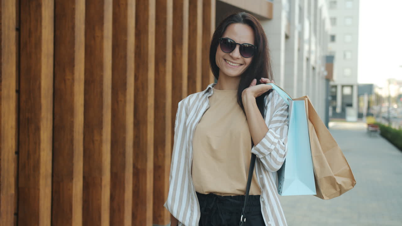 Smiling Woman with Shopping Bags