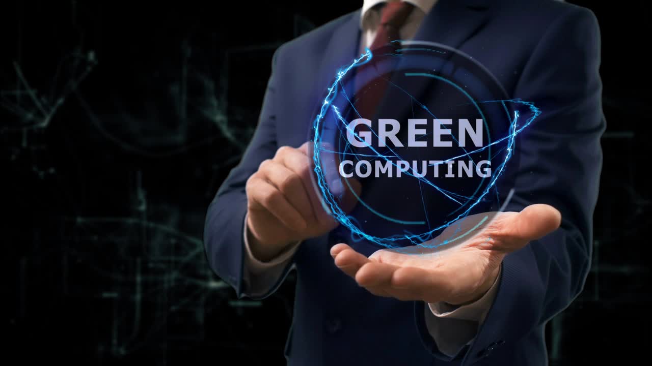 Businessman shows concept hologram Green computing on his hand