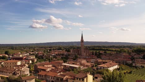 aerial panoramic landscape view over a traditional italian village, on a sunny day