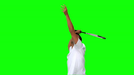 Man-serving-while-playing-tennis-on-green-screen