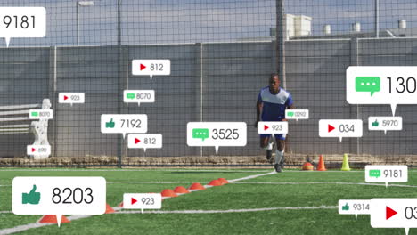 animación de iconos de las redes sociales sobre jugadores de fútbol afroamericanos entrenando en el campo deportivo