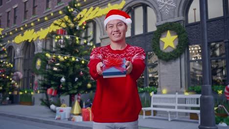 man giving christmas gift