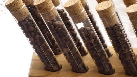 coffee beans in test tubes