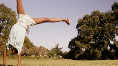 close up of little girl doing an acrobatic