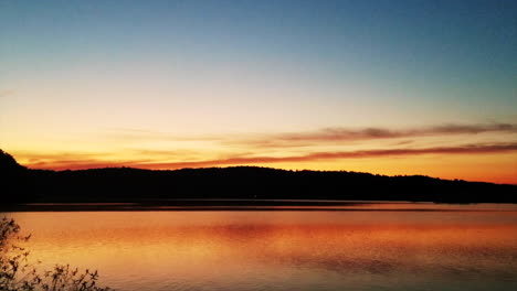 A-beautiful-colorful-sunset-over-a-tranquil-lake