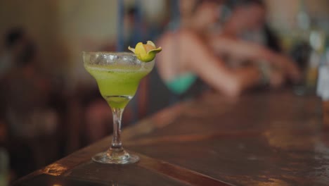 el nido, philippines - a refreshing green lemon cocktail - a drink to quench your thirst - close up shot