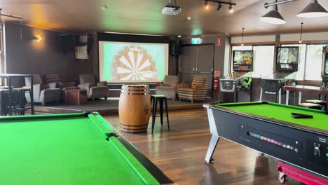 relaxing pub with pool tables and games