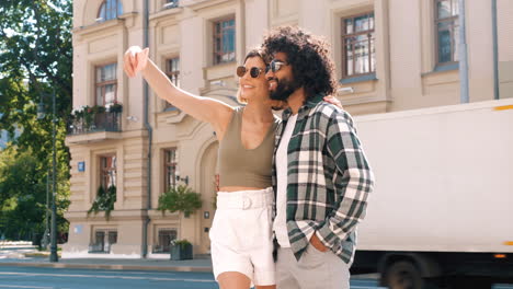 couple taking a selfie outdoors